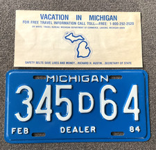 RARE NOS UNUSED 1984 MICHIGAN DEALER LICENSE PLATE ORIGINAL CHEVY FORD DODGE ETC