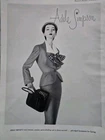 1951 Dovima In Adele Simpson spring suit bow tie purse vintage Fashion Ad