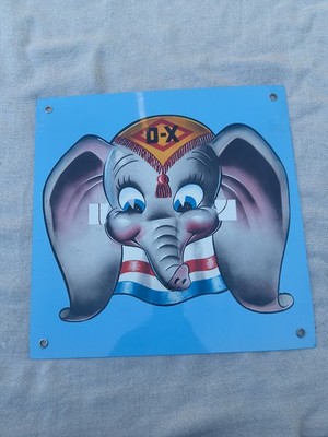 Vintage Dumbo D-X Gasoline Motor Oil Promotional Metal Sign