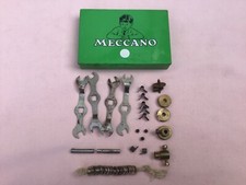 MECCANO VINTAGE OLD LOOSE SPARES IN A TIN ALL IN WELL USED VINTAGE CONDITION.
