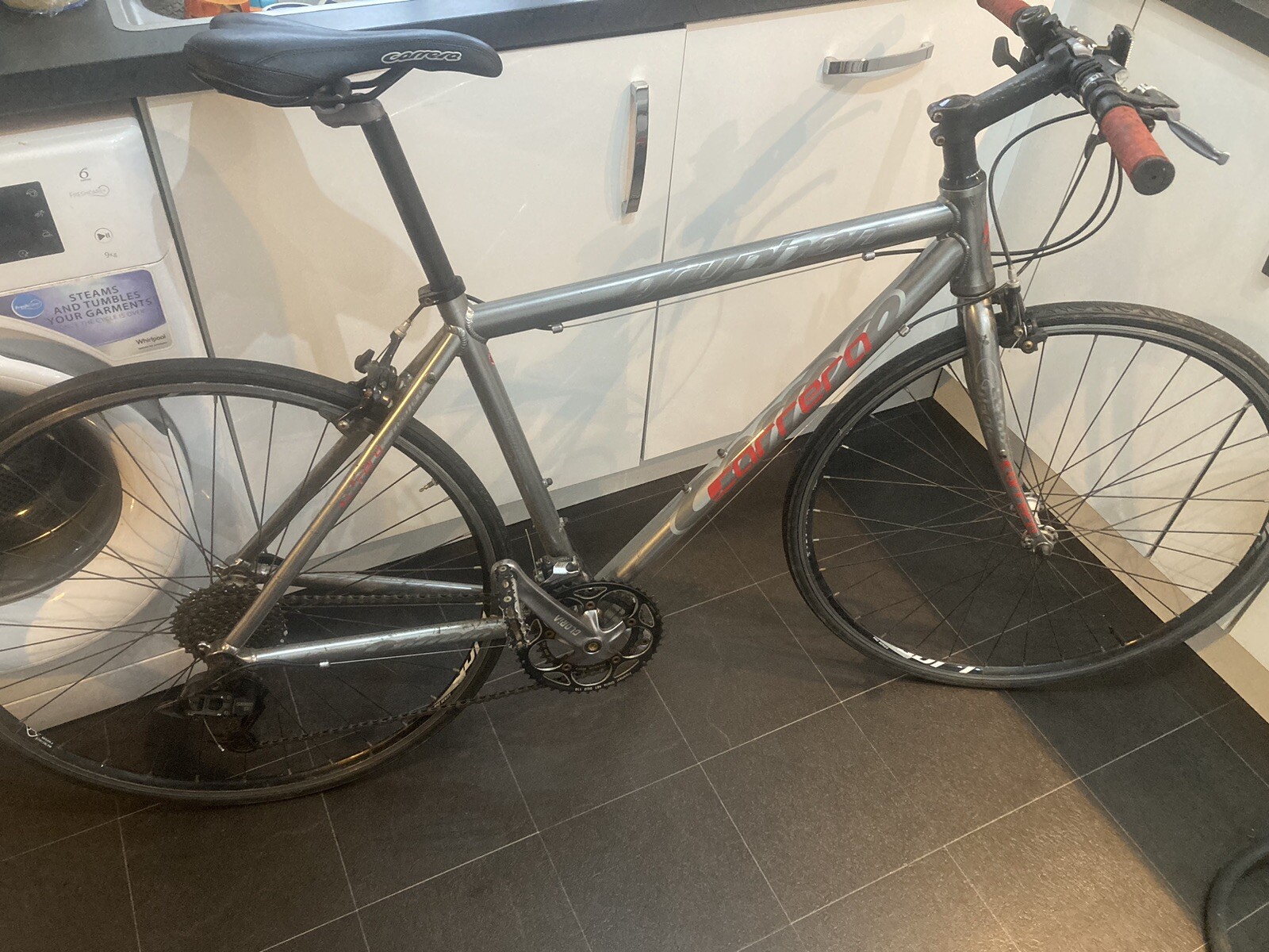 carrera gryphon hybrid bike