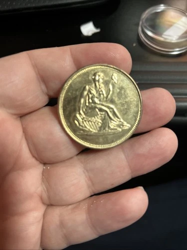 One Troy Oz .999 Fine Silver round with Seated Liberty OBV, Shield REV