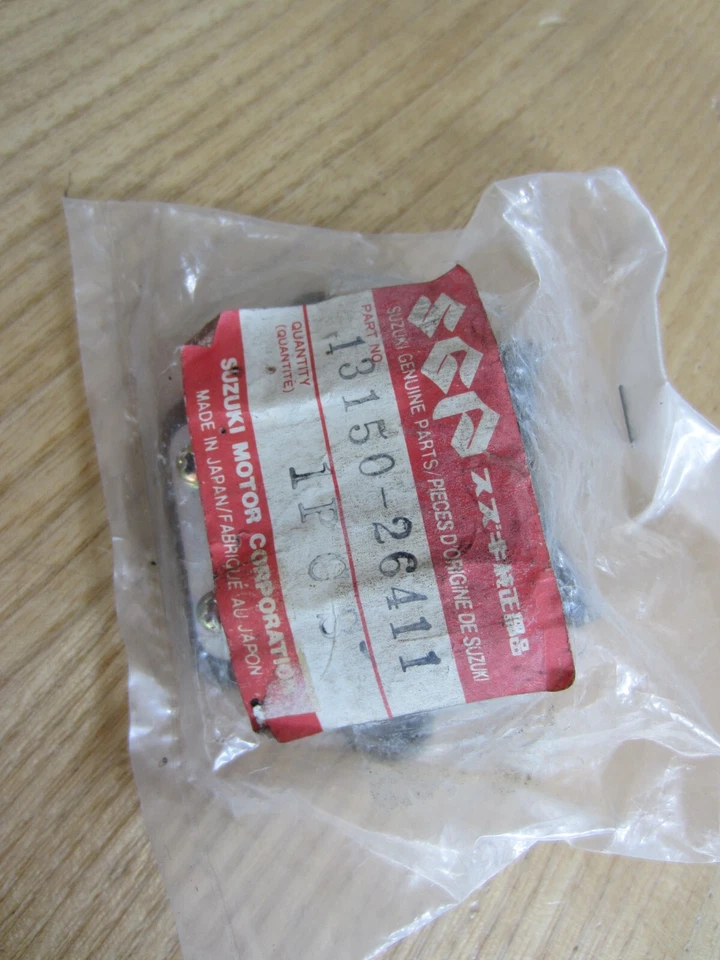 Suzuki NOS 1315026411 Valve Assy Reed DS80 JR80 PV50 RG80 RMX50 ZR50 TS50 Foto 2 de 3