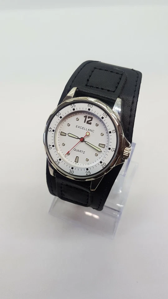 Reloj Excellanc Sports Simple Blanco y Plateado colocado en correa de puño grande negra Foto 2 de 4
