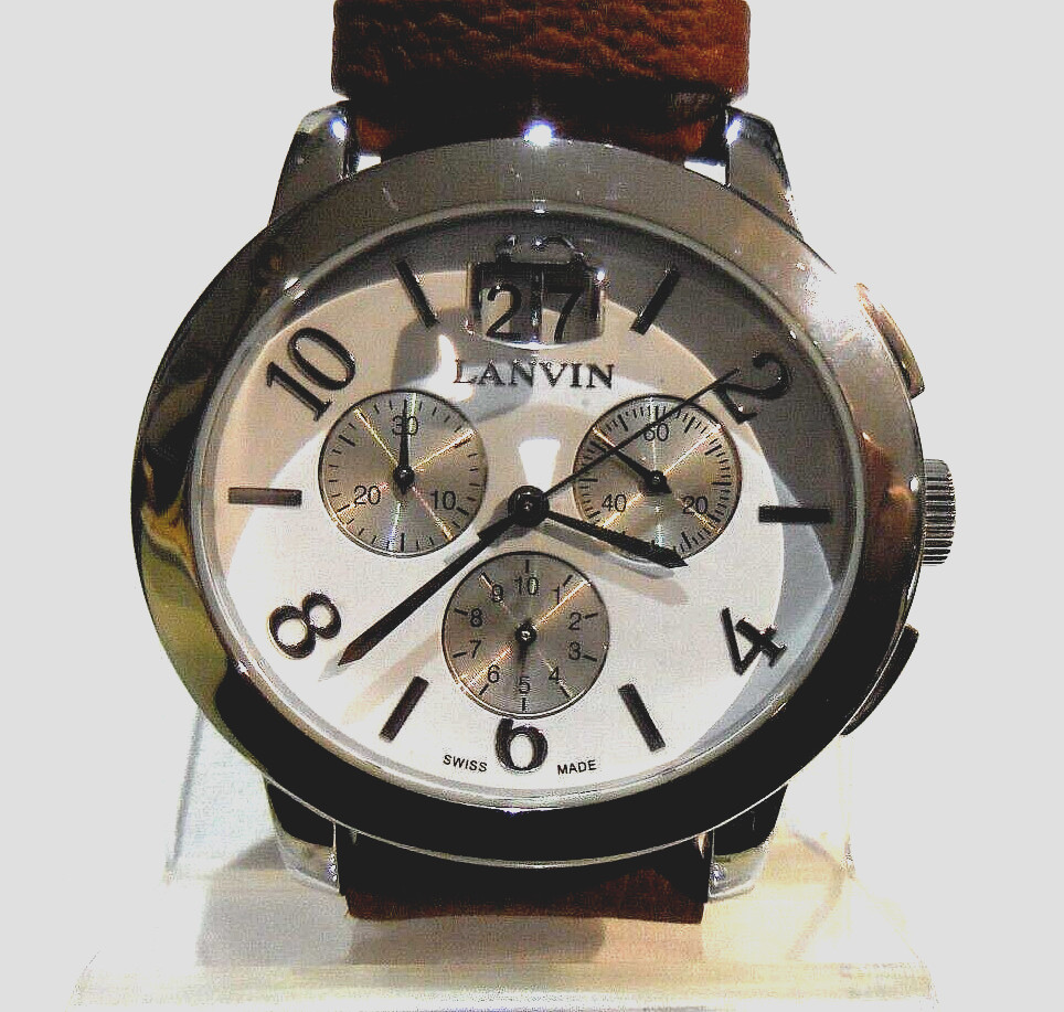 Moutre suisse chronomètre aux centièmes avec guichet date en acier doré