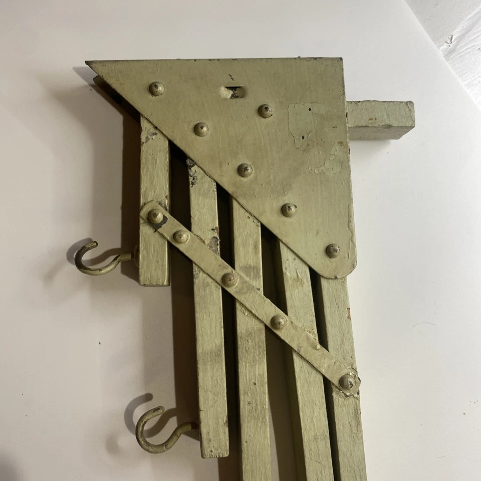Holdsmore Antique Wood and Metal Folding Rack with 5 Hanger Arms and Hooks, 1921 - Image 2 of 4
