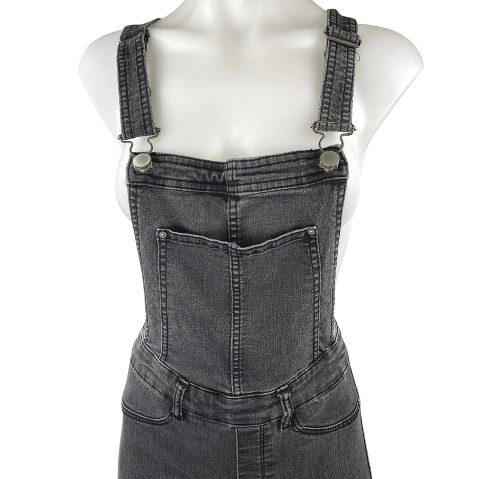 Mono vaquero ajustado con cremallera al tobillo negro dividido H&M talla 4 Foto 3 de 4