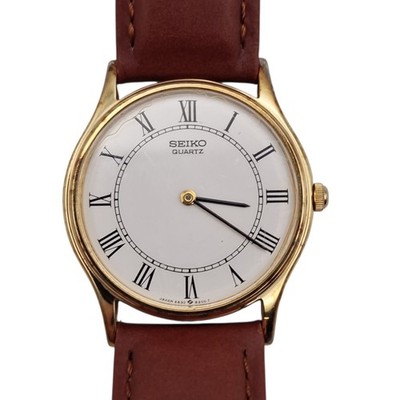 Vintage 1986 Seiko Quartz Ultra Slim Gold Dress Watch Roman Dial