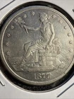 1877-S Silver Trade Dollar -  REV Damage #67