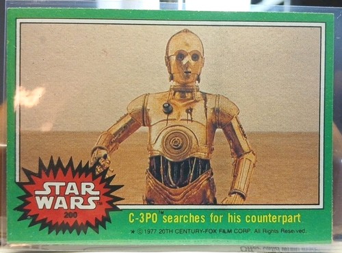 1977 Topps Star Wars #200 C-3PO searches for his counterpart — Raw