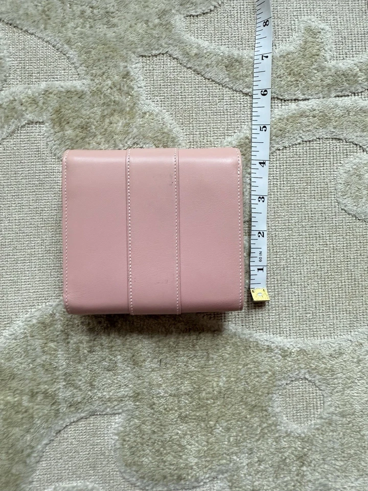 Cartera Cartier de cuero rosa con detalle de anillo Foto 2 de 4