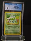 CGC 8 Bulbasaur 1999 Base Set 44/102 Shadowless Sunbeam Error Pokemon Card