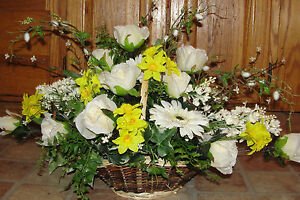 floral arrangement with candle