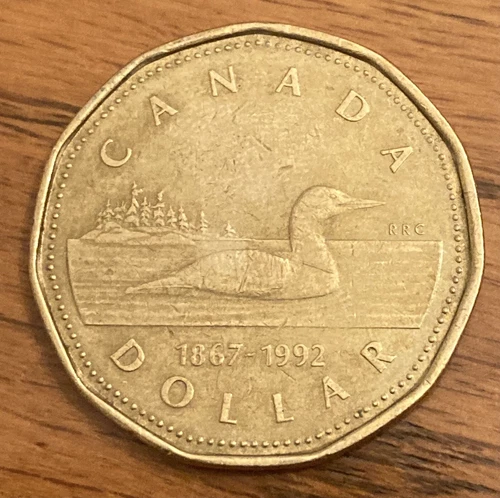 RARE 1867-1992 Canada one dollar $1 loonie **75% off combined shipping**