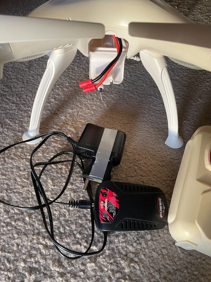 syma Quadrocopter mit Kamera Fernbedienung Ladestadion Drohne ohne Akku defekt - Bild 4 von 4