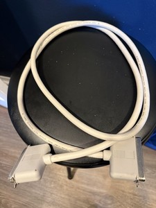 SCSI cable 50 Pin Centronics male to male 69 inches long. Beige color