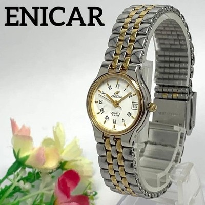 Working condition ENICAR watch, gold, date, quartz movement, Roman numerals. Jap