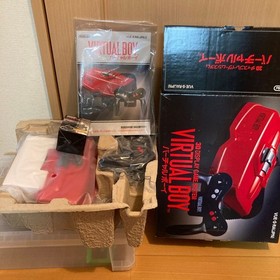 Excellent condition Virtual Boy console + 6 games + AC adapter set.Tested