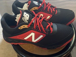 new balance red turf shoes