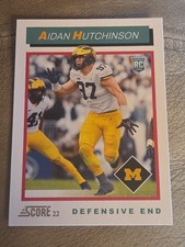 2022 Score #TB6 Aidan Hutchinson 1992 Throwback Rookie Card Michigan Wolverines. rookie card picture