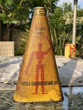 Antique Triangle Stick Man Golden Shell Extra Heavy Lubricating Oil tin - Nice