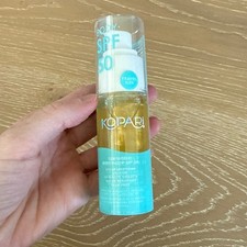 Kopari Sun Shield Body Glow Sunscreen SPF 50 in Gold