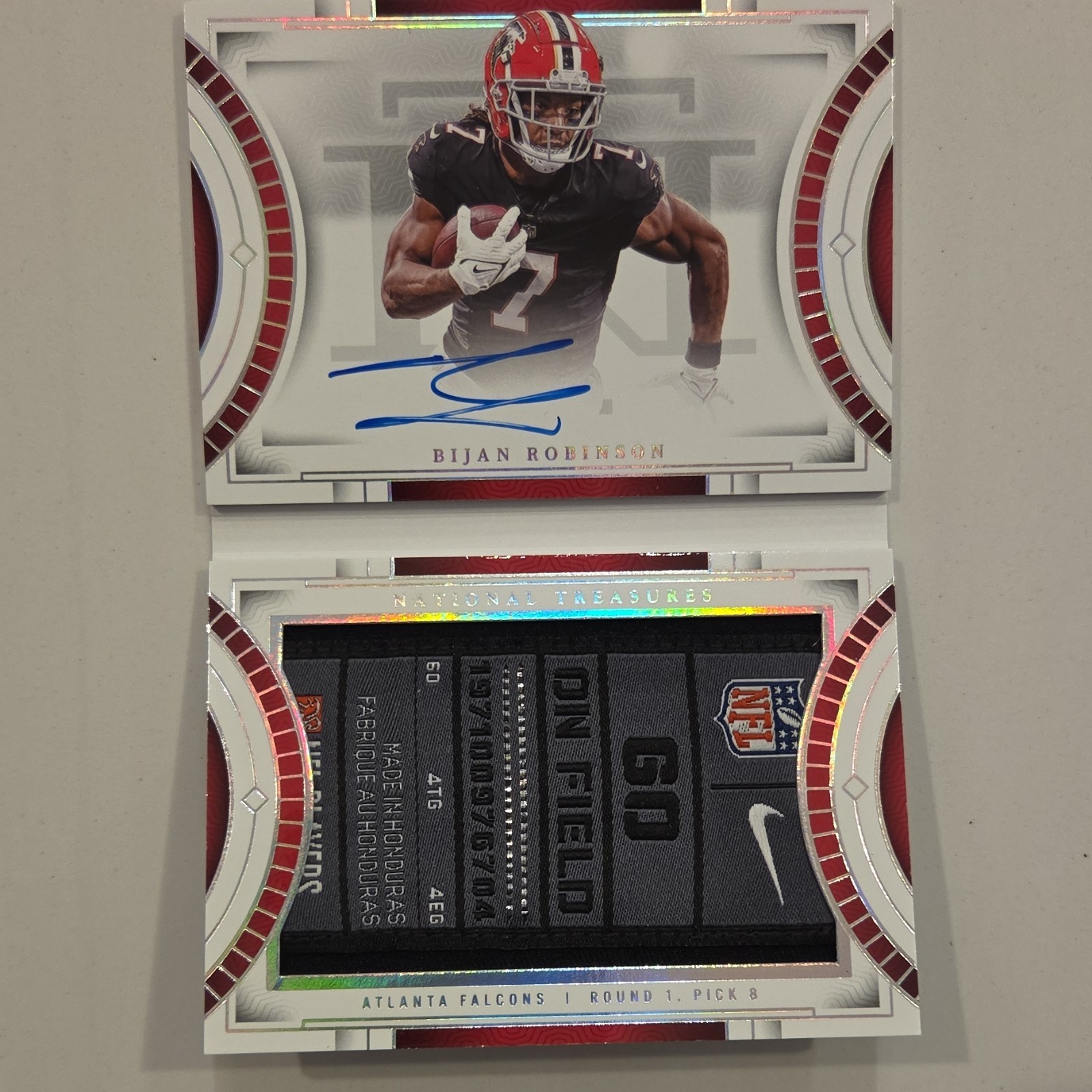 Panini 2023 National Treasures Booklet Bijan Robinson RC Auto RJB-BRN 2/5 view 1