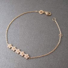 Bracelet fleurs serti de zirconium CZ plaqué or 750/000 BR157-J