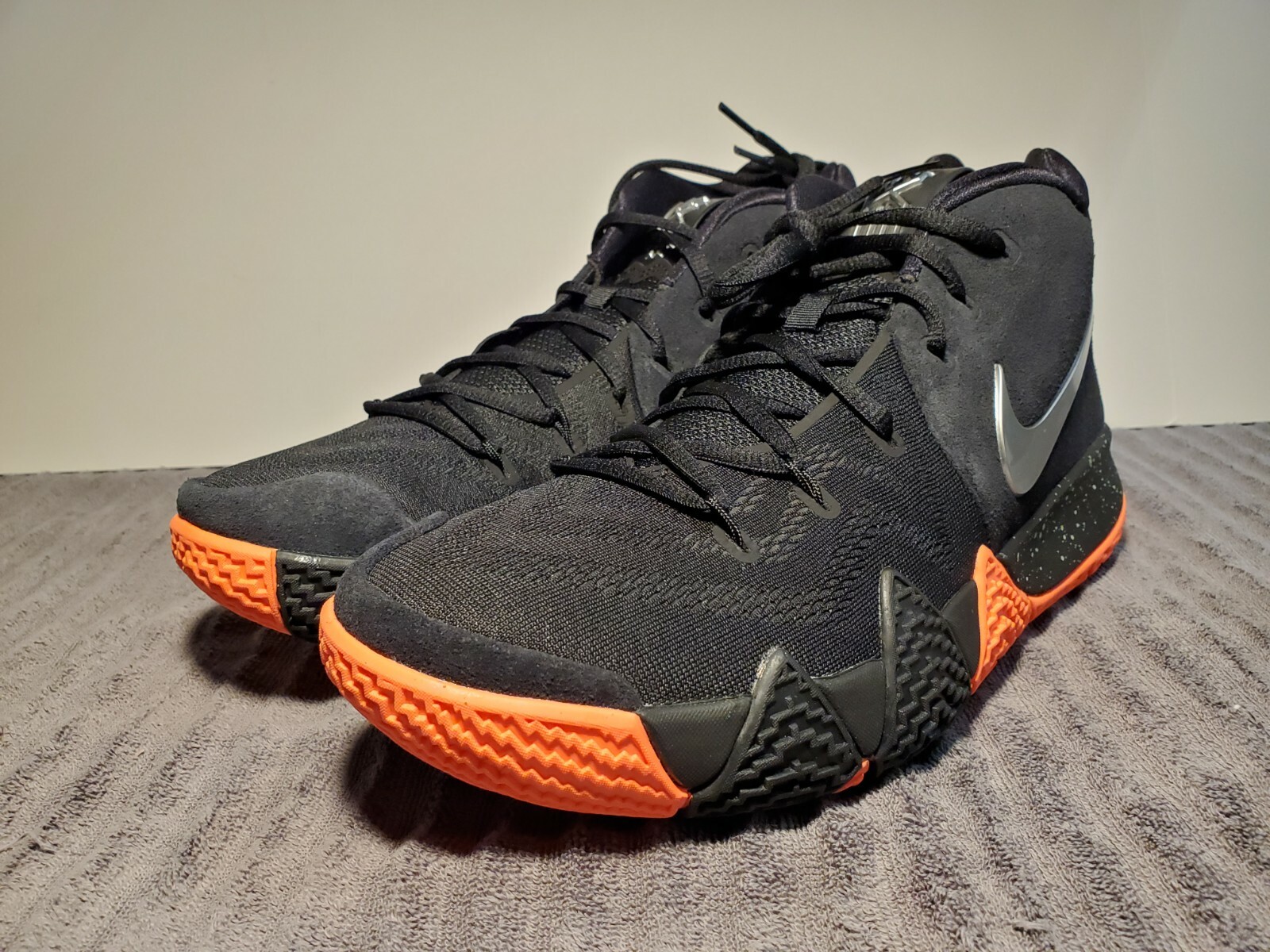 kyrie 4 black and orange