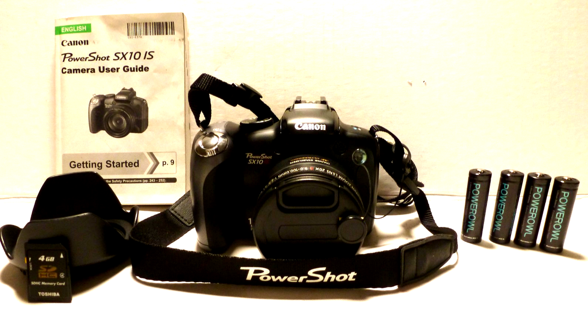 Canon PowerShot SX10 IS Digital Camera 20x Zoom Flip LCD w/Card