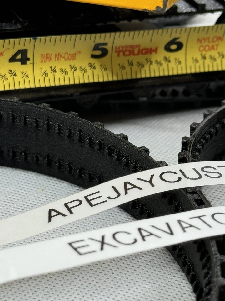 1 par de orugas nuevas para excavadora John Deere Ertl 1/16 todo metal #505 Foto 3 de 3