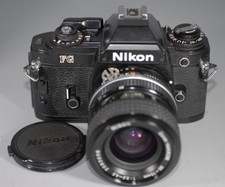 Nikon FG Black manual focus film camera w 35-70mm f3.3-4.5 Nikkor Ais lens -Ex