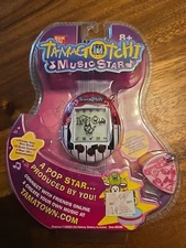 2009 BANDAI TAMAGTOTCHI MUSIC STAR RED TOP BRAND NEW VERY RARE FACTORY SEALED