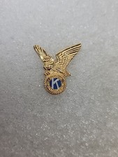 Kiwanis International Eagle Gold Toned Pin Blue Circle Black Rubber Back