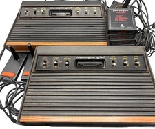  2 Atari 2600 Light Sixer for Parts or Restore with 1 PSU  Joysticks AS IS