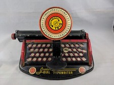 Antique Junior Dial Typewriter by Louis Marx Co. New York NY Red Black Yellow