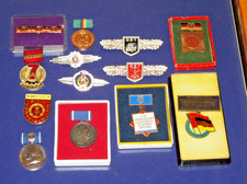 East German DDR Collection of Cold War medals and badges GST Border Guard.