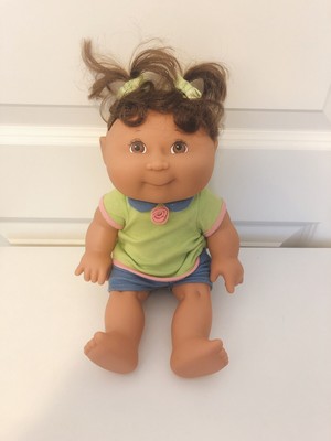 cabbage patch doll with pigtails