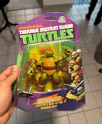 Nickelodeon Teenage Mutant Ninja Turtles Michelangelo Action-Figur mit Nunchaku