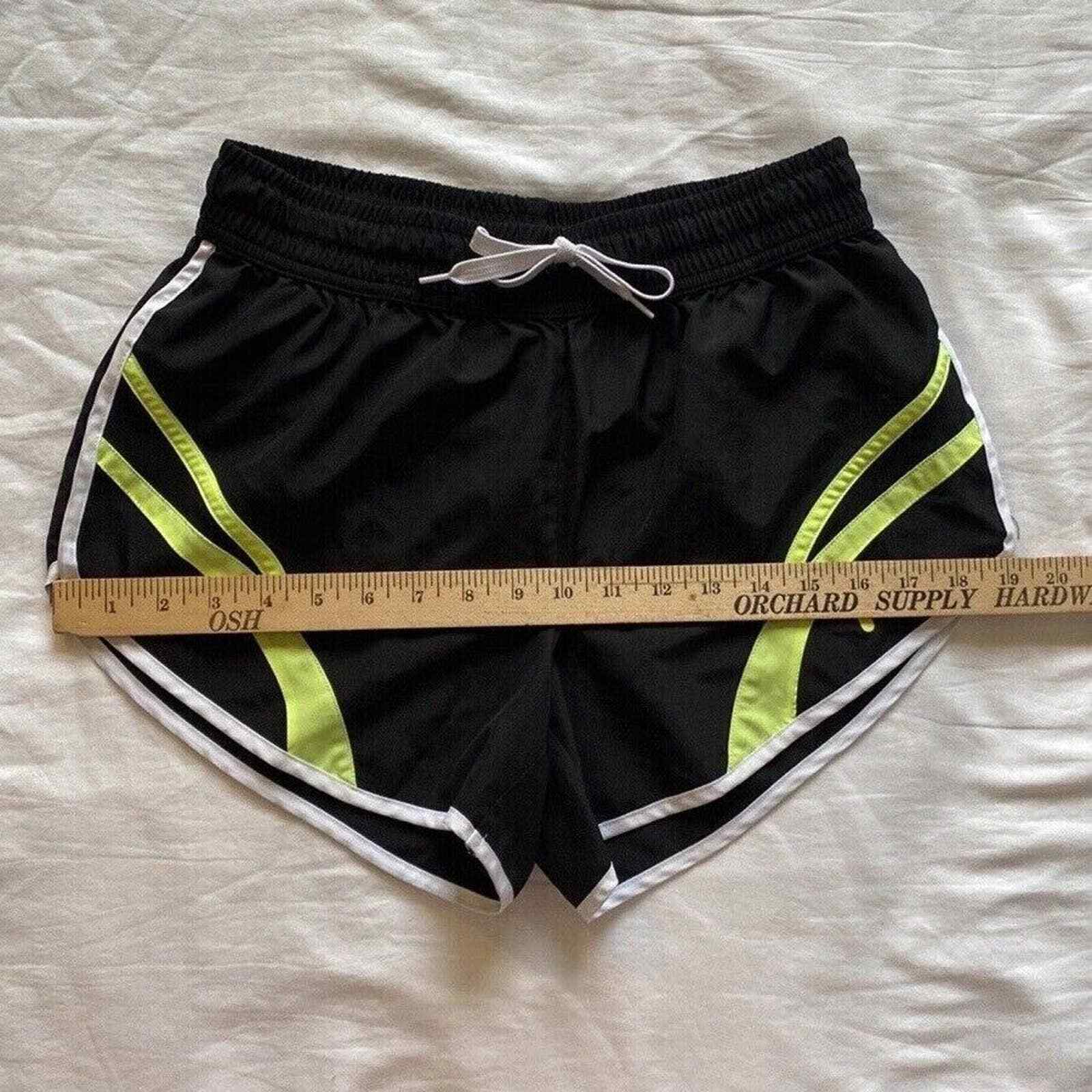 Pantaloncini da corsa Fila donna sm neri riflettenti fluorescenti giallo verde foderati di sicurezza