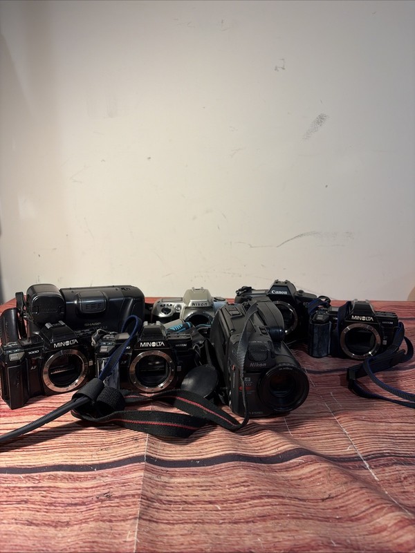 Lot of  7 Assorted Cameras Canon Nikon Minolta Sharp - (As Is/for Parts)
