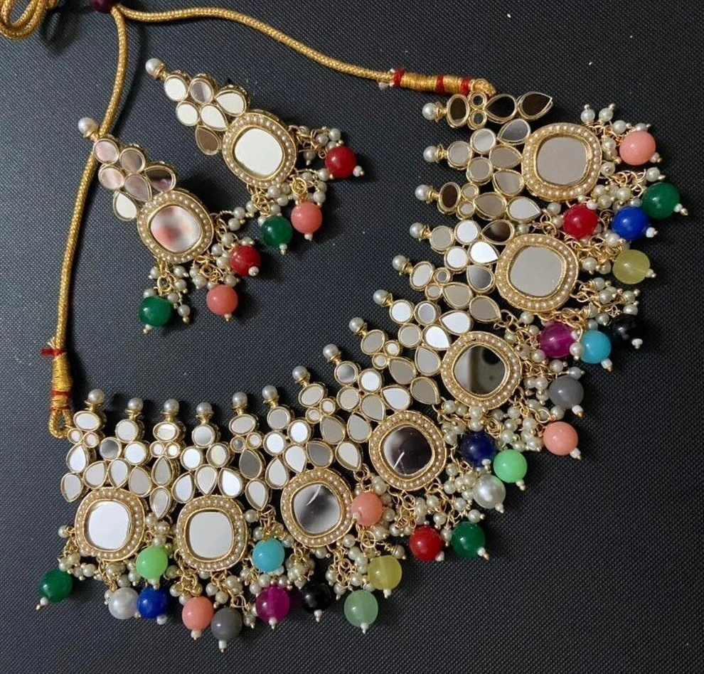 Glass kundan best sale jewellery