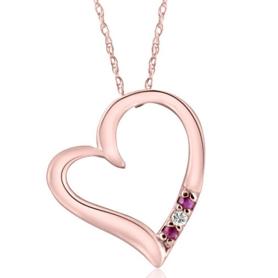 Colgante corazón diamante y rubí oro rosa de 3 piedras con cadena de 18"