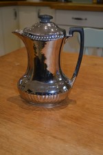 Devonware silver coated china teapot (Stoke on Trent England)