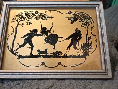 vintage scherenschnitte silhouette framed picture Victorian swing set dog 1920?