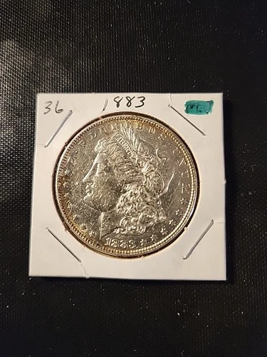 1883 Morgan Silver Dollar In About Uncirculated Condition