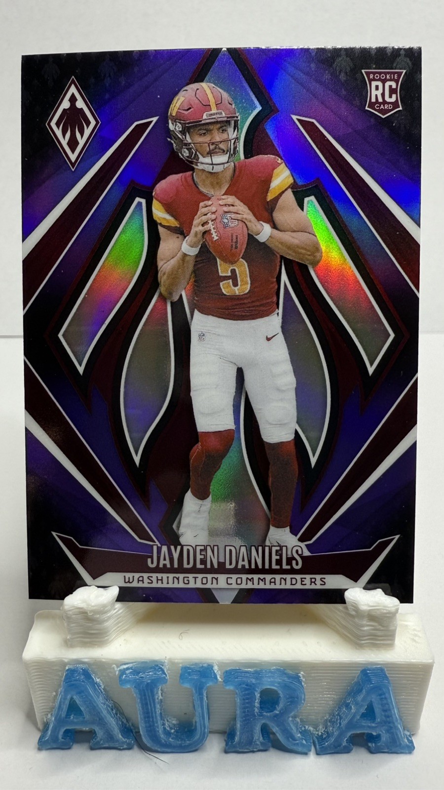 2024 Panini Phoenix Jayden Daniels Rookie Purple Fade RC #198 Commanders