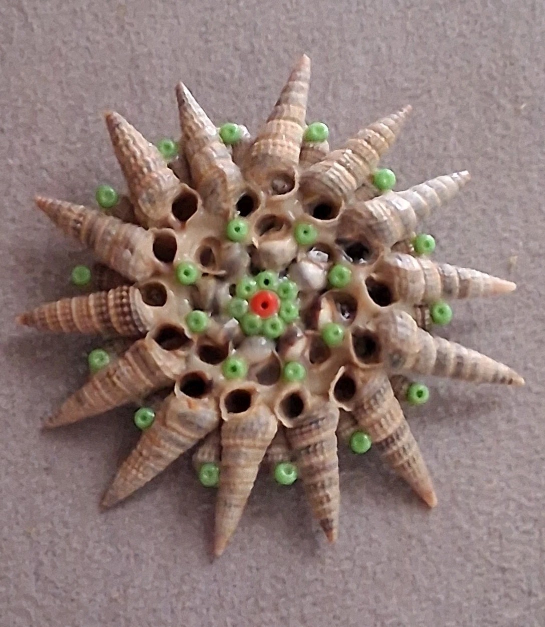 Handmade seashell brooch, starburst pattern, folk… - image 1