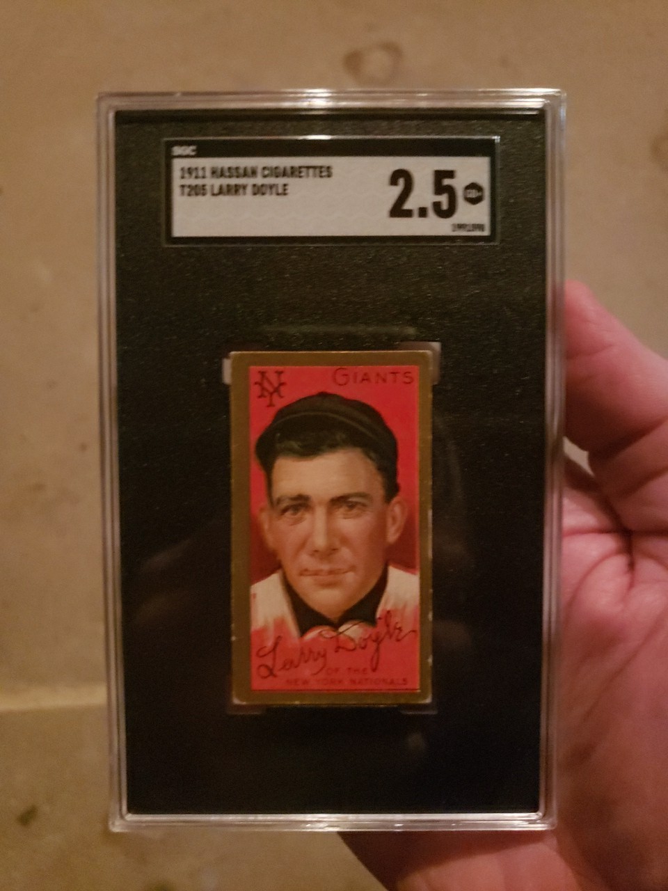 1911 T205 Hassan Cigarettes LARRY DOYLE -SGC 2.5 GD+  Pop 1 Double Vision Print