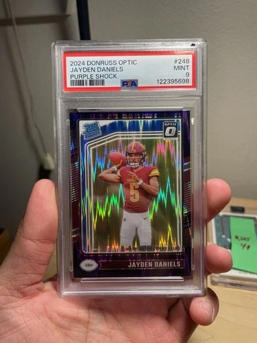 PSA 9 2024 Panini Optic - Rated Rookie Jayden Daniels #248 Purple Shock Prizm